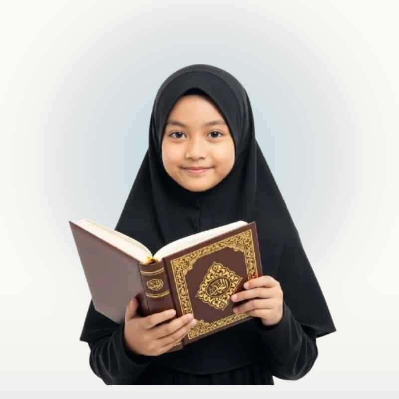 Young student holding the Qur'an